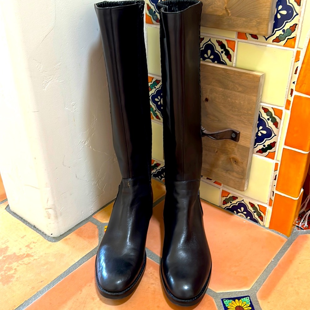 Black leather boots by Cole Haan